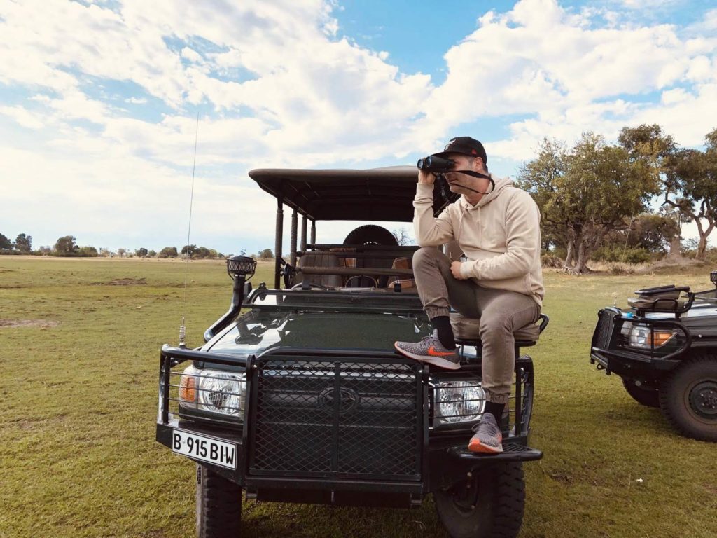 team Enzo seated on a safari 4x4