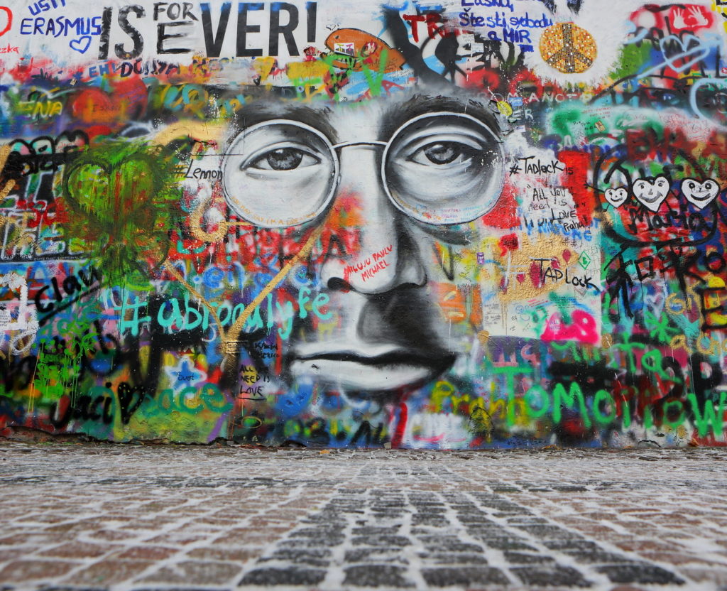 The Lennon Wall in Prague is covered with graffiti inspired by John Lennon.