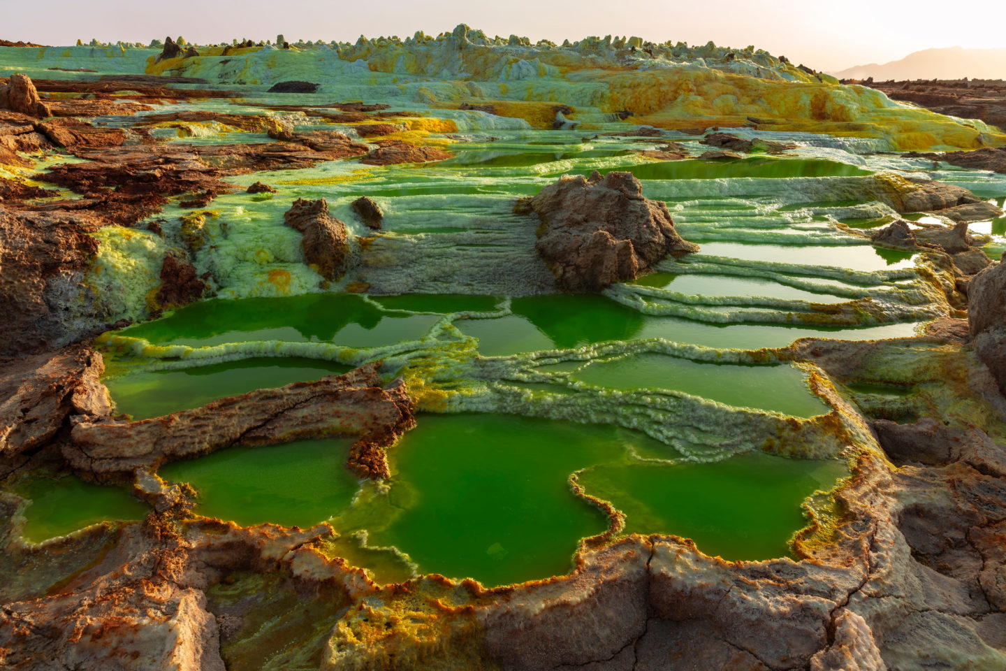 Visit the Danakil Despression in Ethiopia which is the hottest place on earth