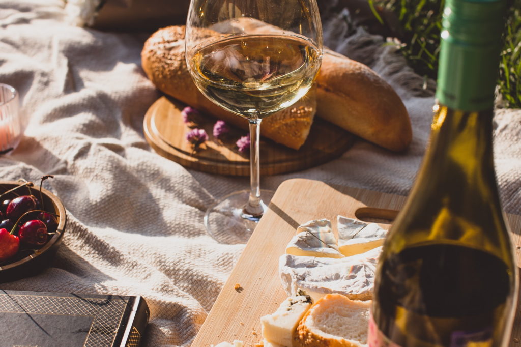 Enjoy French wine and cheese while in France.