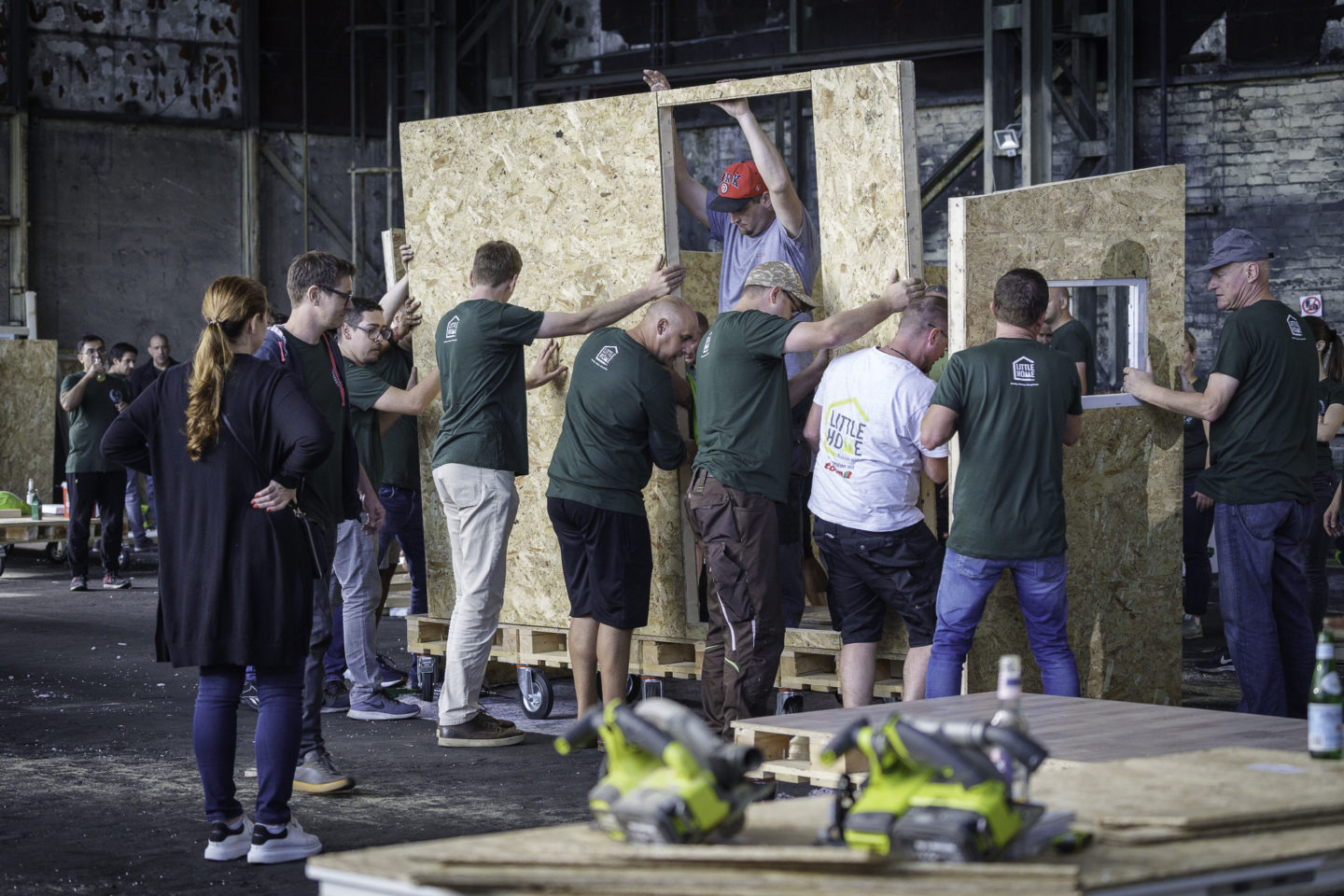 Group constructing a portable cabin for event in Berlin