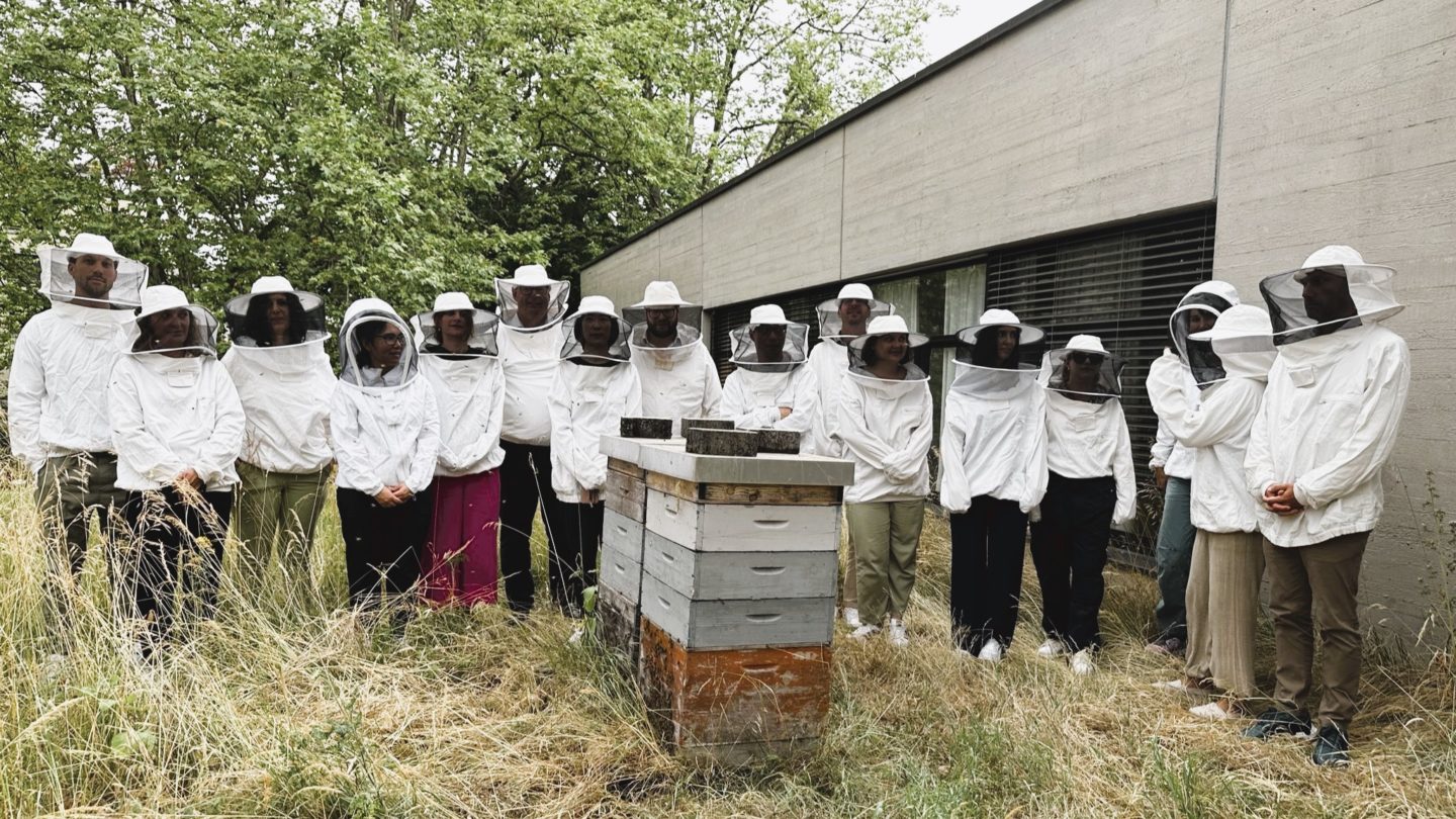 A group of people in protective suits