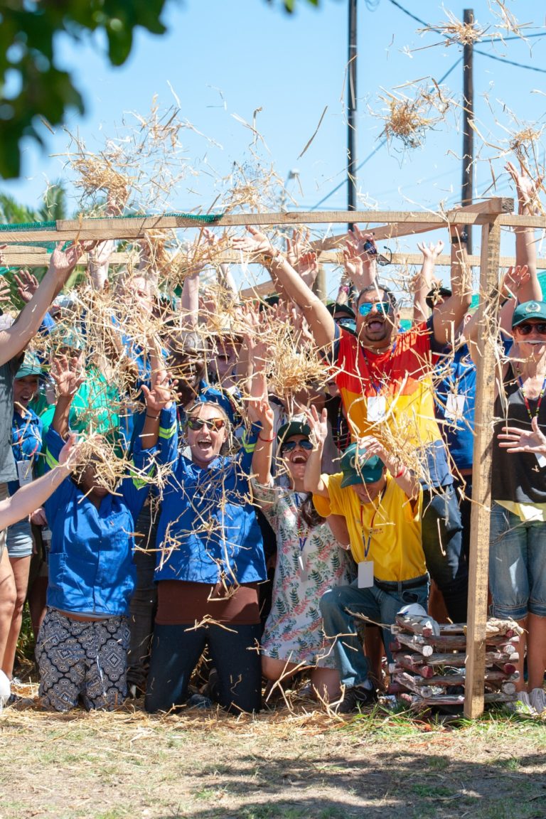 The group cheers after a successful CSR day.