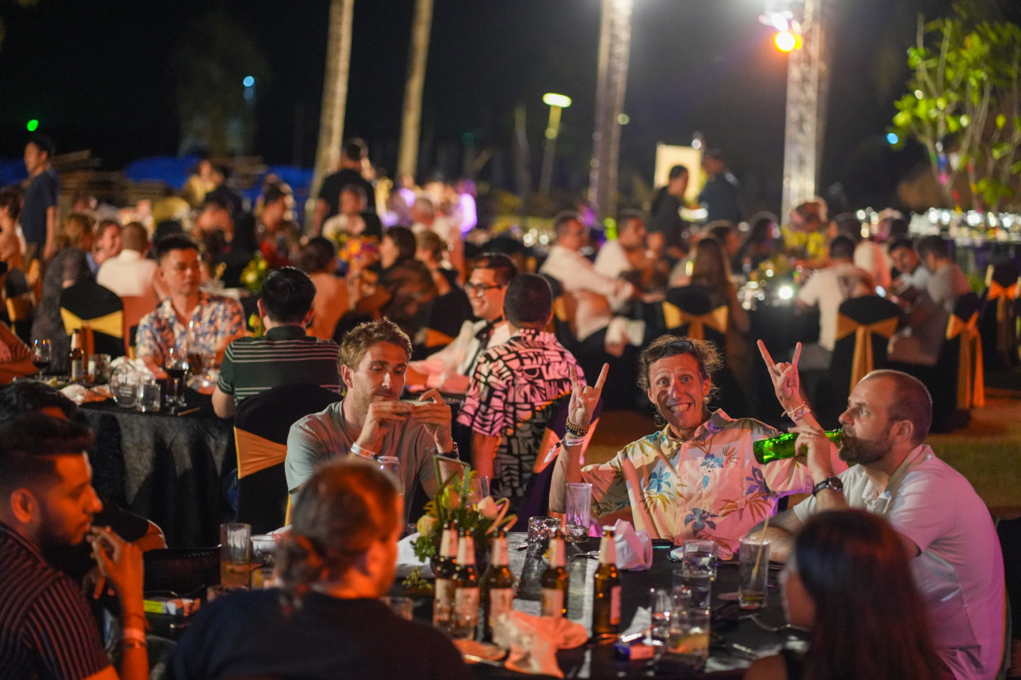 The guests of a corporate event have a good evening in Phuket, Thailand.