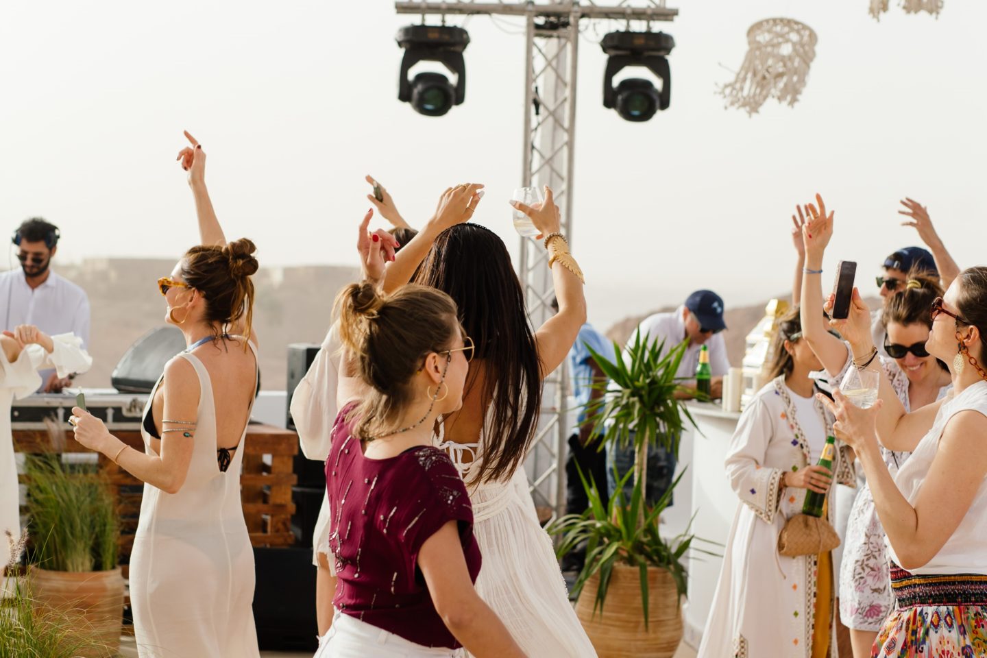 Guests enjoy and dance during the day party during a private event in Egypt.