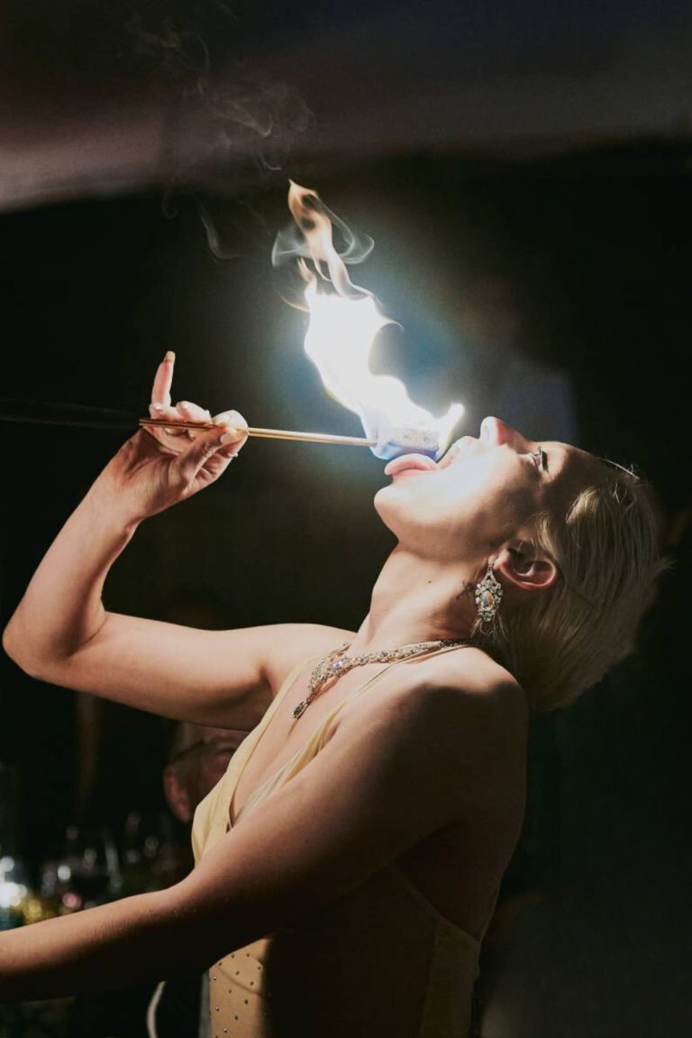 A fire eater delights guests during a private event in Puglia, Italy.