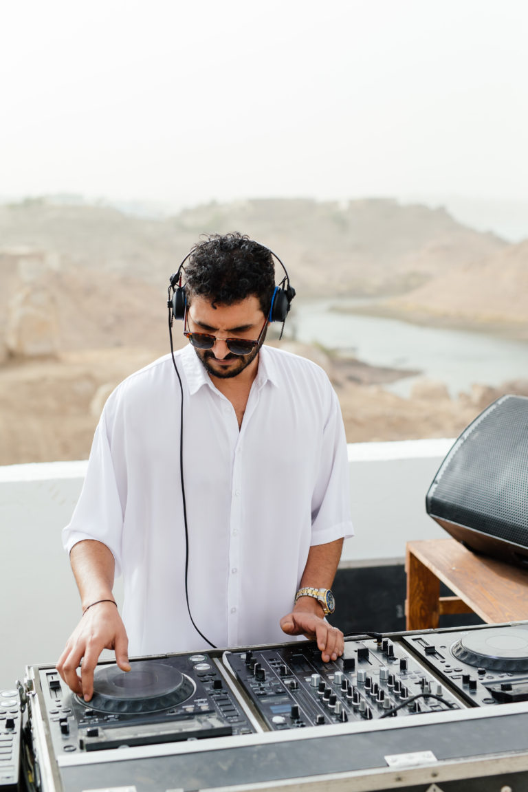 The DJ sets the mood at a day party during a private event in Egypt.